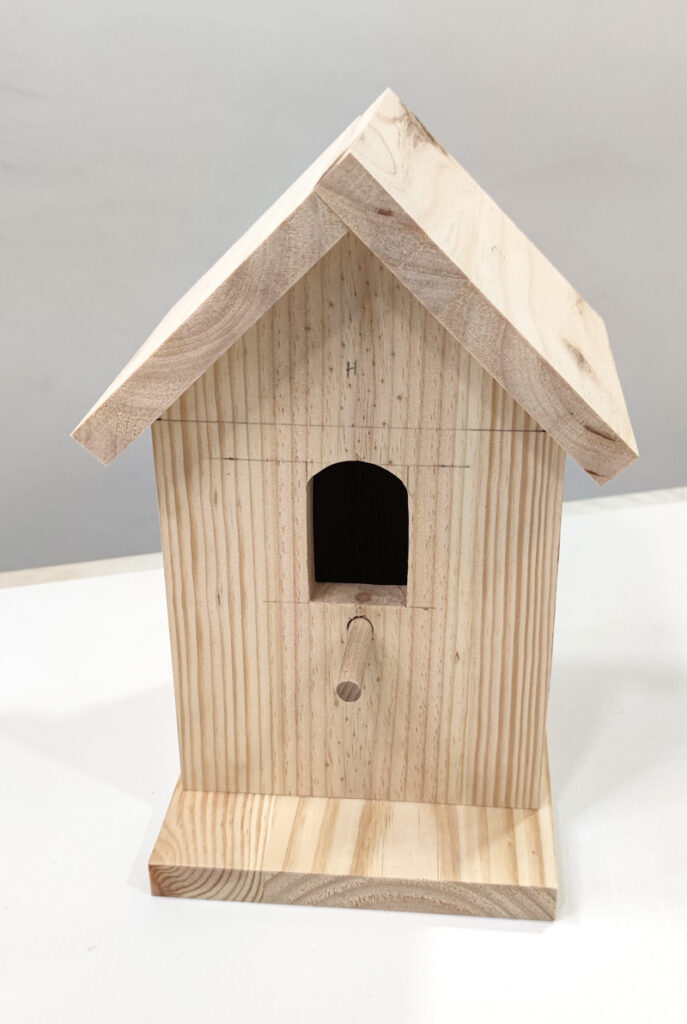 Casita de madera para pájaros de Badabadoc Art